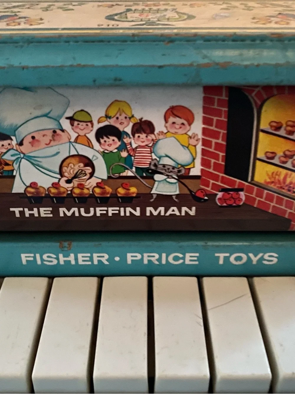 Fisher-Price Change-a-Tune Piano in Teal, Yellow and White